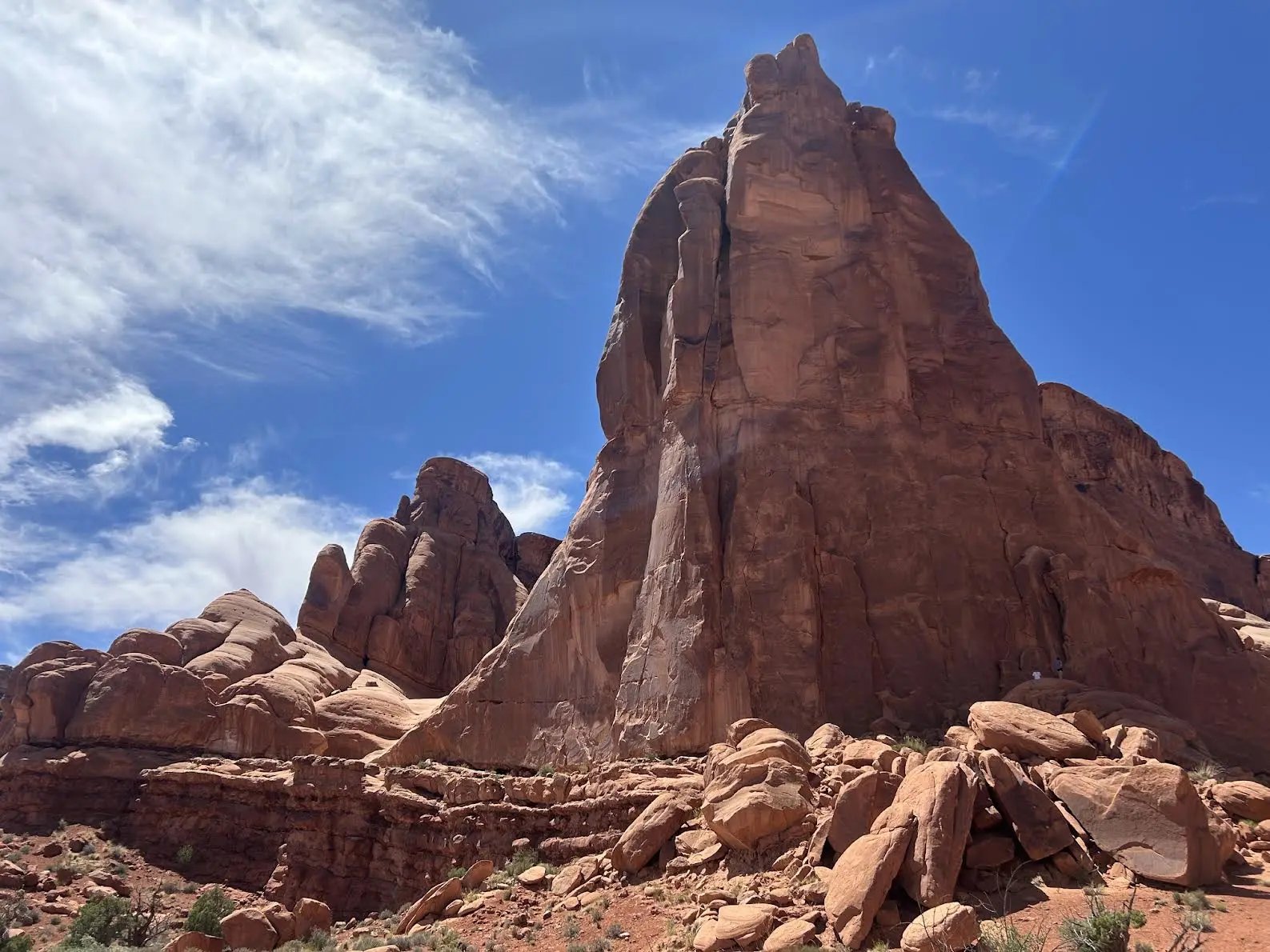 Massive rock dome jutting out dwarfing everything around it